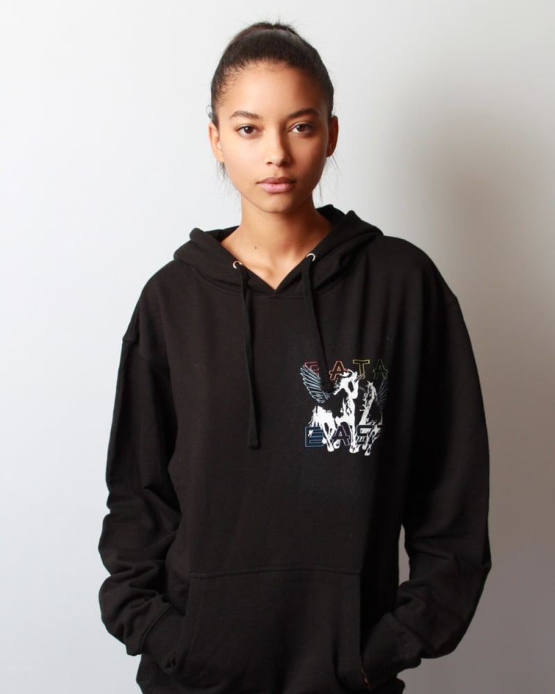 Front of a model wearing a size 3 Drawstring Hoodie with Rainbow Unicorns in Black by BAST EAST. | dia_product_style_image_id:291888